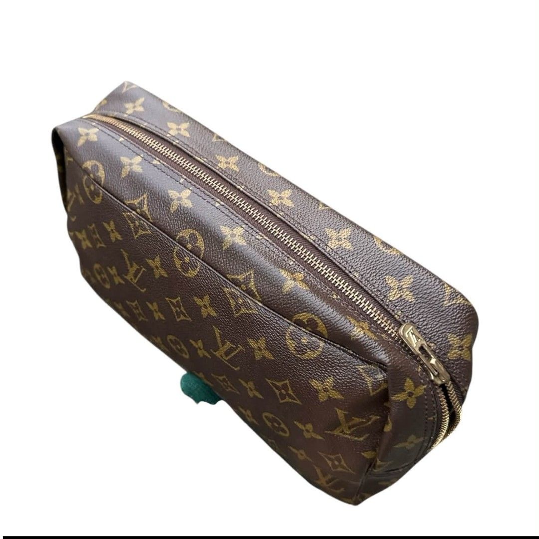 Louis Vuitton Monogram Toiletry Pouch Cosmetic Bag (Category: Luxury Bags & Wallets) located in Manila. Submitted by borbone13335092 (Listing ID 1469524186, Image 3). Description: - Authentic Louis Vuitton Classic Monogram toiletry pouch - Iconic brown canvas exterior with signature LV print - Secure top gold-tone zipper closure - Spacious rectangular interior for daily essentials and makeup - Impeccable, clean stitching along all edges - Hardwar