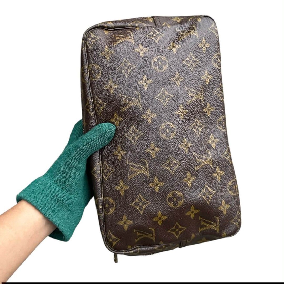 Louis Vuitton Monogram Toiletry Pouch Cosmetic Bag (Category: Luxury Bags & Wallets) located in Manila. Submitted by borbone13335092 (Listing ID 1469524186, Image 2). Description: - Authentic Louis Vuitton Classic Monogram toiletry pouch - Iconic brown canvas exterior with signature LV print - Secure top gold-tone zipper closure - Spacious rectangular interior for daily essentials and makeup - Impeccable, clean stitching along all edges - Hardwar