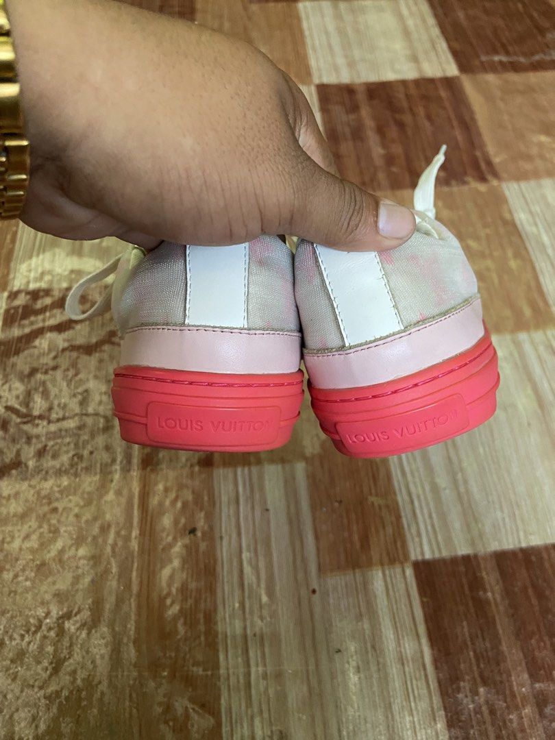Louis Vuitton Pink Monogram Canvas Sneakers (Category: Sneakers) located in Manila. Submitted by thriftnijheero (Listing ID 1469483743, Image 2). Description: - Brand: Louis Vuitton - Material: Pink monogram canvas with white leather tongue tag - Closure: White laces with gold-tone eyelets - Soles: Bright pink rubber soles featuring embossed LV logo on the bottom and Louis Vuitton lettering on the heel - Condition: Excellent buyer-friendly condit