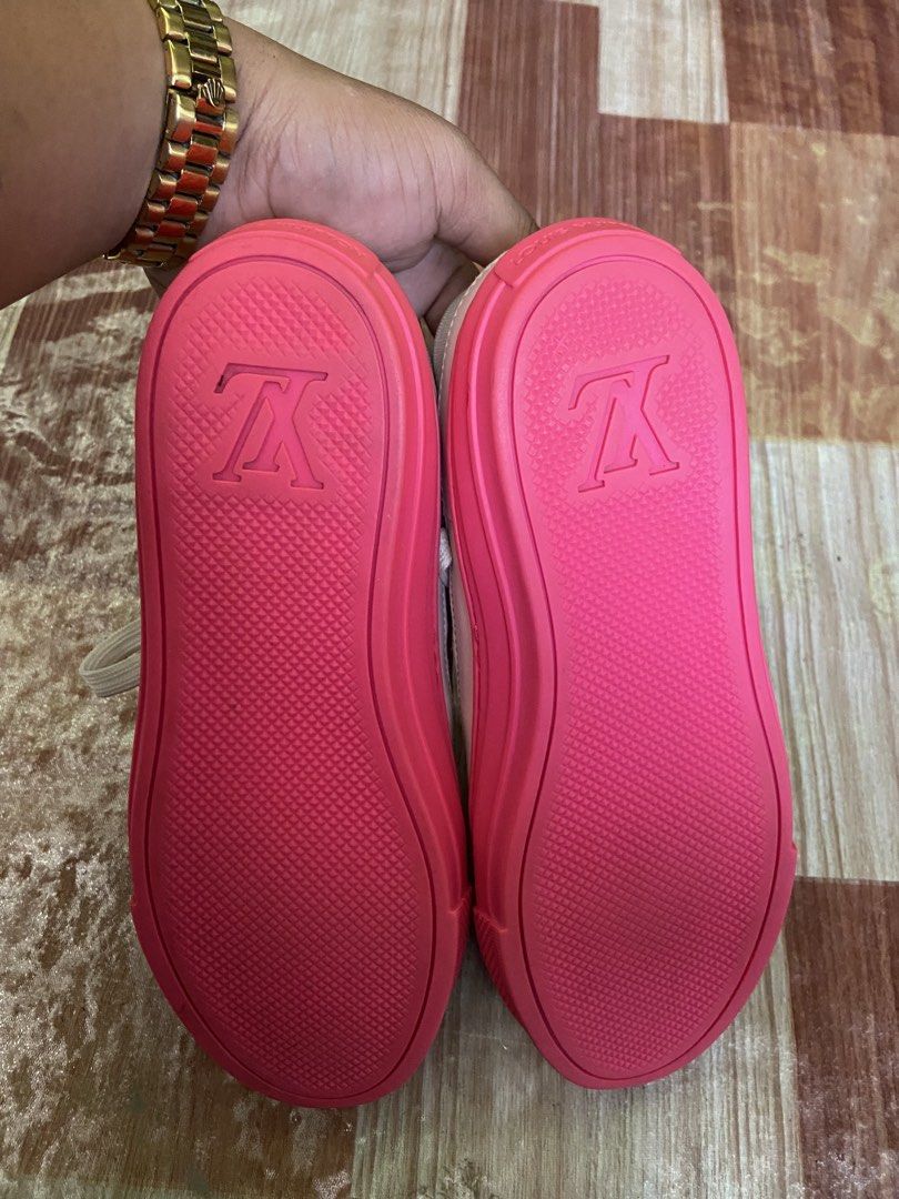 Louis Vuitton Pink Monogram Canvas Sneakers (Category: Sneakers) located in Manila. Submitted by thriftnijheero (Listing ID 1469483743, Image 3). Description: - Brand: Louis Vuitton - Material: Pink monogram canvas with white leather tongue tag - Closure: White laces with gold-tone eyelets - Soles: Bright pink rubber soles featuring embossed LV logo on the bottom and Louis Vuitton lettering on the heel - Condition: Excellent buyer-friendly condit