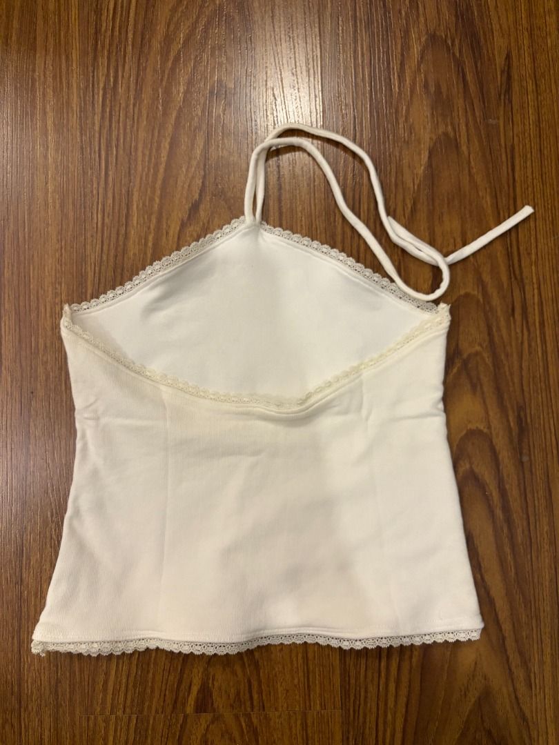 Love by Dianna White Halter Top (Category: Sleeveless) located in Caloocan City. Submitted by jadorearchive (Listing ID 1469520316, Image 2). Description: Only washed, never worn Bought this from Love by Dianna on IG a few years ago Halter tank top with thin tie straps Has delicate lace trim and beaded design Best fits XS-S.