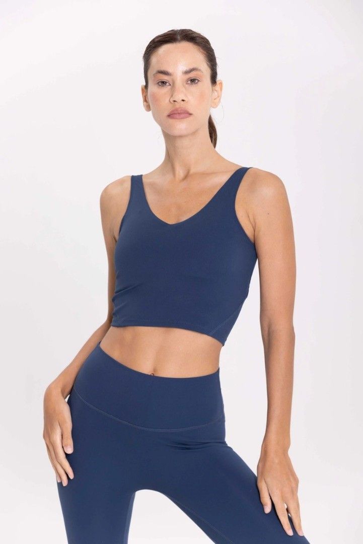 Lululemon Align Tank Top in Navy Blue (Category: Activewear) located in Gapan. Submitted by lovelypreloved1497 (Listing ID 1469403377, Image 3). Description: Letting go of this absolute workout staple—the iconic Lululemon Align Tank! Crafted from Lululemon's famous Nulu™ fabric, it feels weightless, buttery-soft, and stretches beautifully with your body. Features a flattering plunging neckline and a built-in shelf bra with pockets for removable p