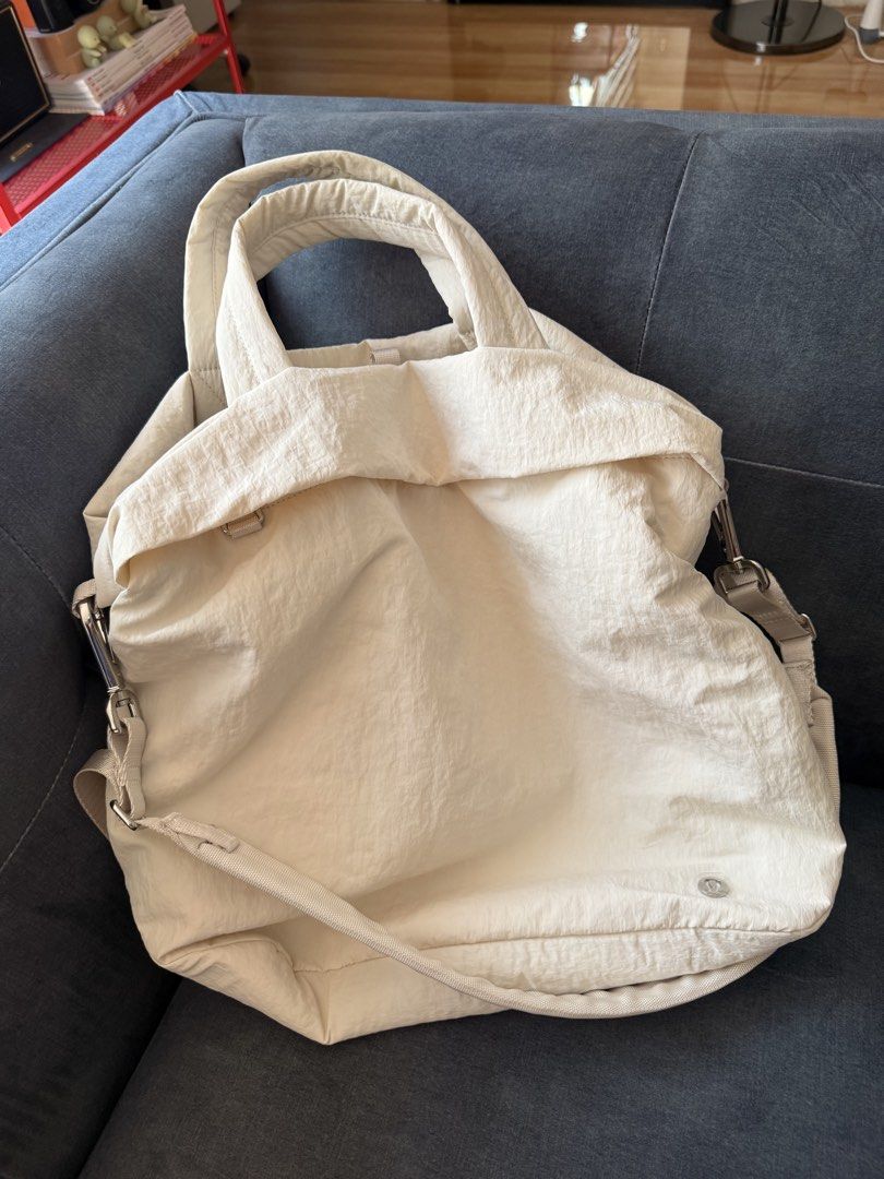 Lululemon Crossbody Bag (Category: Cross-body Bags) located in Pasay City. Submitted by mcsanmig (Listing ID 1469417445, Image 1). Description: Bought in Australia Used once only as an extra bag inside the car Perfect as an overnight bag/gym bag/diaper bag Nylon (waterproof) and lightweight No dirt, stains, or any flaws Can pass as brand new (with protective sticker pa yung logo).