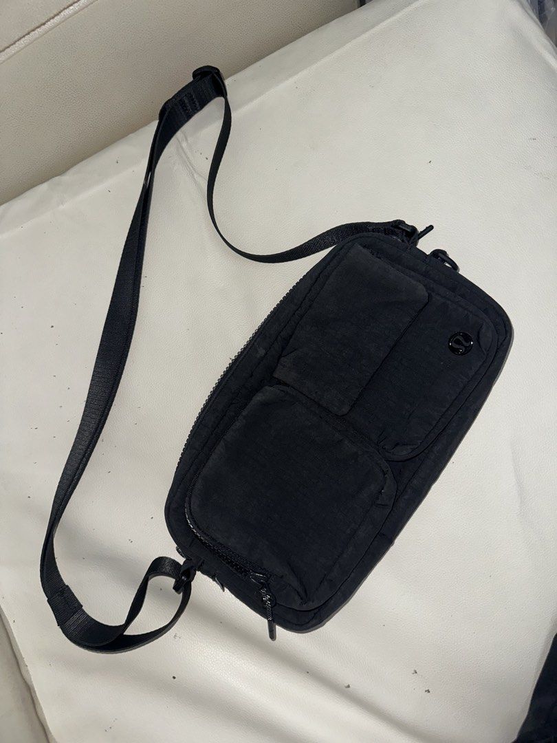Lululemon Multi-Pocket Crossbody Bag 2.5L (Category: Luxury Bags & Wallets) located in Pasay City. Submitted by itsmeazula (Listing ID 1469462549, Image 1). Description: Bag dimensions: 25.5cm x 4cm x 13cm (10" x 1.6" x 5.1") Strap length when fully extended: 140cm (55.1") Volume: 2.5L Product Features Adjustable shoulder strap for comfortable carrying Zippered exterior pockets Exterior flap-front pocket with magnetic snap closure Clip your favou