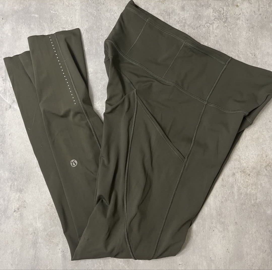 Lululemon Olive Green Leggings with Pockets (Category: Activewear) located in General Trias. Submitted by abellu (Listing ID 1469517111, Image 2). Description: - Brand: Lululemon - Color: Dark Olive Green - Rise: High-rise waistband for ultimate comfort and support - Pockets: Deep side drop-in pockets that easily fit smartphones plus back waistband storage - Safety: Reflective dot details near the lower leg cuffs for low-light visibility - Brandi