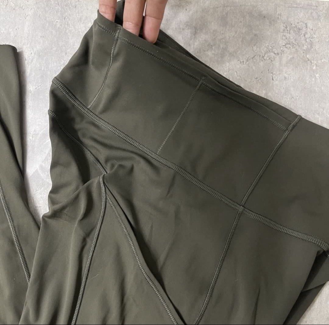 Lululemon Olive Green Leggings with Pockets (Category: Activewear) located in General Trias. Submitted by abellu (Listing ID 1469517111, Image 3). Description: - Brand: Lululemon - Color: Dark Olive Green - Rise: High-rise waistband for ultimate comfort and support - Pockets: Deep side drop-in pockets that easily fit smartphones plus back waistband storage - Safety: Reflective dot details near the lower leg cuffs for low-light visibility - Brandi