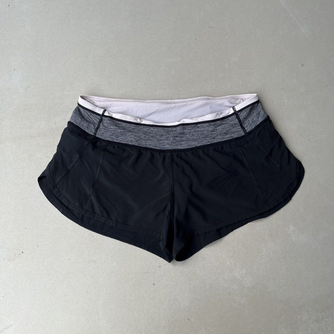 Lululemon Speed Up Shorts Black Grey White Size Medium (Category: Shorts) located in Mandaue City. Submitted by chinsyap_03 (Listing ID 1469461553, Image 2). Description: - Brand: Lululemon - Style: Athletic running shorts with built-in liner - Colorway: Black, grey, and white - Fit & Size: Mid-rise, fits 28 to 30 inches waist, 8.5 inches length - Features: Wide waistband, secure back zip pocket, reflective logo on left hem - Condition: Great ove