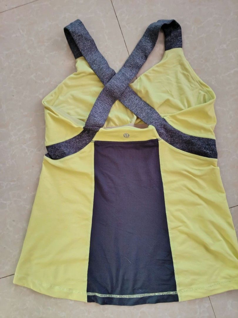 LULULEMON Yellow Activewear (Category: Activewear) located in San Fernando. Submitted by avylll_thrift (Listing ID 1469424747, Image 2). Description: Crossback design Size L Yellow and Grey Color combination Full length.