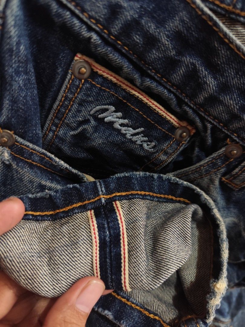 Madness selvedge distressed jeans (Category: Jeans) located in Kabacan. Submitted by thriftpingts (Listing ID 1469436932, Image 3). Description: Madness selvedge button fly jeans Condition: 10/10 Color rate : 10/10 Waist: 30-32 Length: 39 Hem: 7 Washtags: ✅ Issue: ❌.