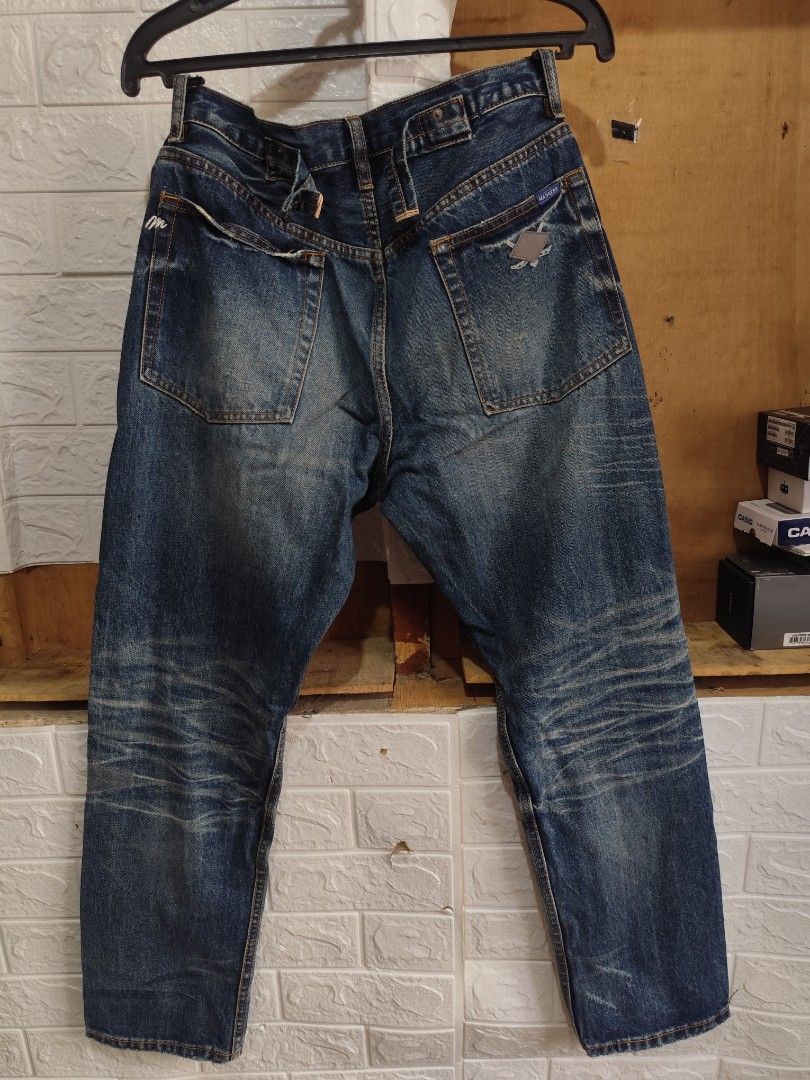 Madness selvedge distressed jeans (Category: Jeans) located in Kabacan. Submitted by thriftpingts (Listing ID 1469436932, Image 2). Description: Madness selvedge button fly jeans Condition: 10/10 Color rate : 10/10 Waist: 30-32 Length: 39 Hem: 7 Washtags: ✅ Issue: ❌.