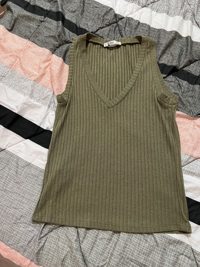 MANGO Basics Olive Green Ribbed Tank Top (Category: Sleeveless) located in Manila. Submitted by sph_preloved (Listing ID 1469523616, Image 1). Description: Price not negotiable unless buying at least 5 items. No ww photos. Location: QC Mode of delivery: grab/lalamove SF to be shouldered by the buyer .