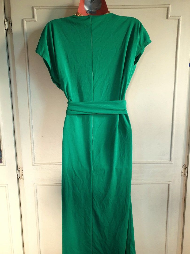 MANGO Green WRAP Dress Size XS (Category: Dresses) located in Quezon City. Submitted by carbonfootprint (Listing ID 1469550536, Image 2). Description: - Brand: Mango - Color: Solid green - Size: EUR XS / USA 2, ANKLE-Length for 5'1" - Material: 69% polyester, 31% recycled polyester - Style: V-neckline, cap sleeves, wrap style with side waist tie - Length: 31 inches from waist to hem - Condition: Great piece, simple and classic for party or office