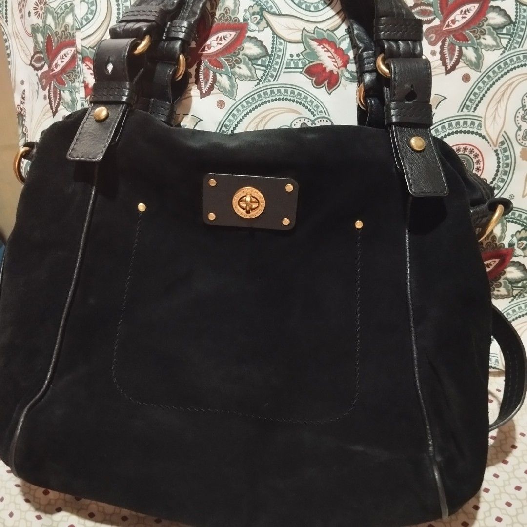 Marc by Marc Jacobs black suede handbag with strap (Category: Cross-body Bags) located in Manila. Submitted by lene48 (Listing ID 1469403943, Image 1). Description: Marc by Marc Jacobs black suede bag. Gold-tone hardware and turnlock closure on the front pocket. Double top handles plus an adjustable, detachable leather shoulder strap. Includes original dust bag. Deep main compartment with a soft texture throughout. Clean condition, well stored..