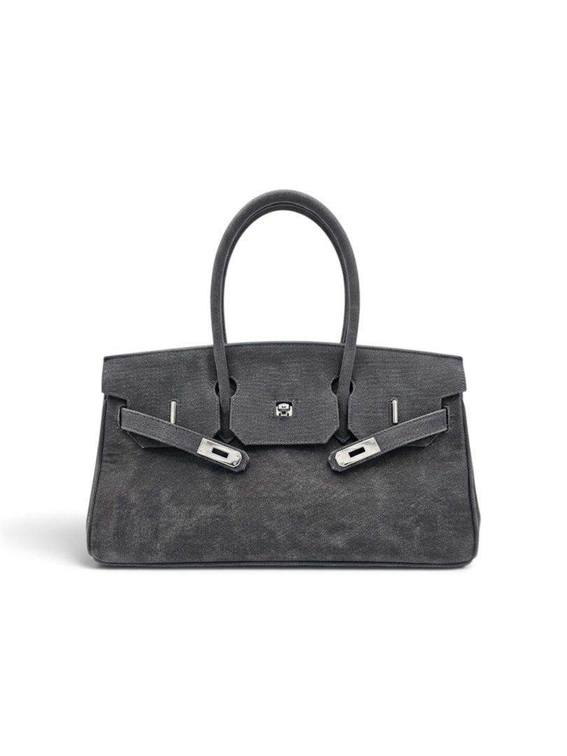 Margin Goods Birkin Dark Grey Canvas (Category: Shoulder Bags) located in Lapu Lapu. Submitted by ukaydecebuofficial (Listing ID 1469448278, Image 1). Description: - Color: Dark grey canvas - Hardware: Silver finish with turn-lock closure - Handles: Dual top handles - Design: Structured tote shape with signature strap detailing - Style: Classic style with a relaxed fabric texture.