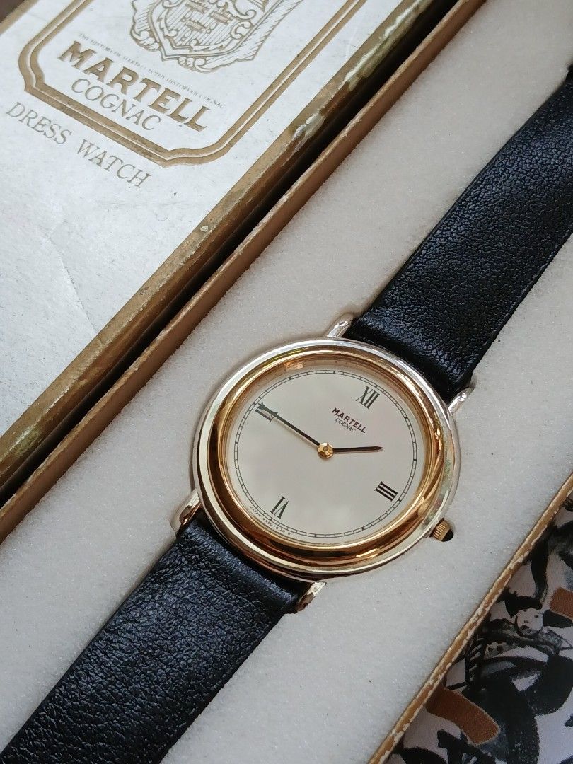 MARTELL COGNAC, Quartz (Category: Luxury Watches) located in Tabaco. Submitted by igoys-watches (Listing ID 1469443726, Image 3). Description: MARTELL COGNAC, Quartz ✅️Good Running Condition ✅️All Original Head ✅️With Original Box and Manual ✅️New Old Stock ✅️Pristine Condition ✅️Elegant and Minimalist Design ✅️Goldtone Bezel and Silvertone Case ✅️Two-hand Watch ✅️Roman Numeral Markers ✅️Neo-Vintage, 1980s ✅️Newly replaced battery ✅️Clean Crystal