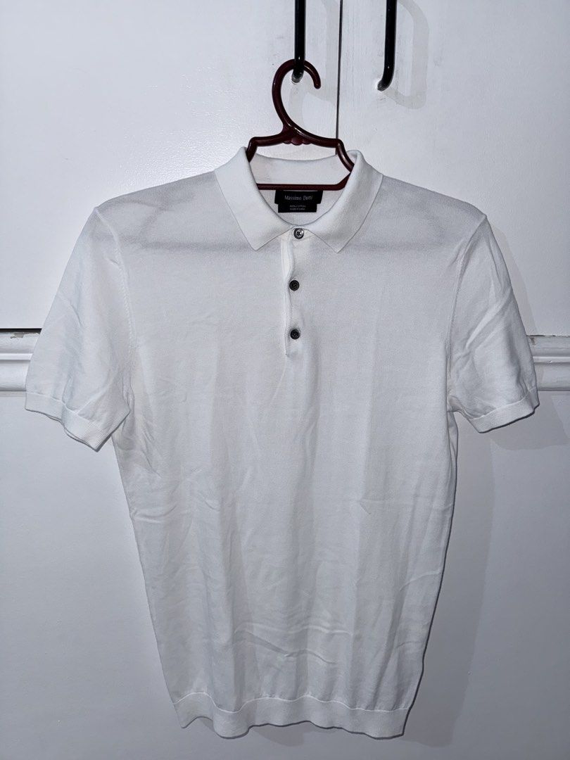 Massimo Dutti White Knit Polo Shirt (Category: Tshirts & Polo Shirts ) located in Subic. Submitted by sushi8_ (Listing ID 1469523939, Image 1). Description: - Brand: Massimo Dutti - Material: 100% premium cotton - Color: Clean solid white - Style: Short-sleeve knit polo with classic collar and three-button placket - Details: Ribbed cuffs and hem for a structured fit - Texture: Lightweight knit fabric, highly breathable - Condition: Excellent/ Use