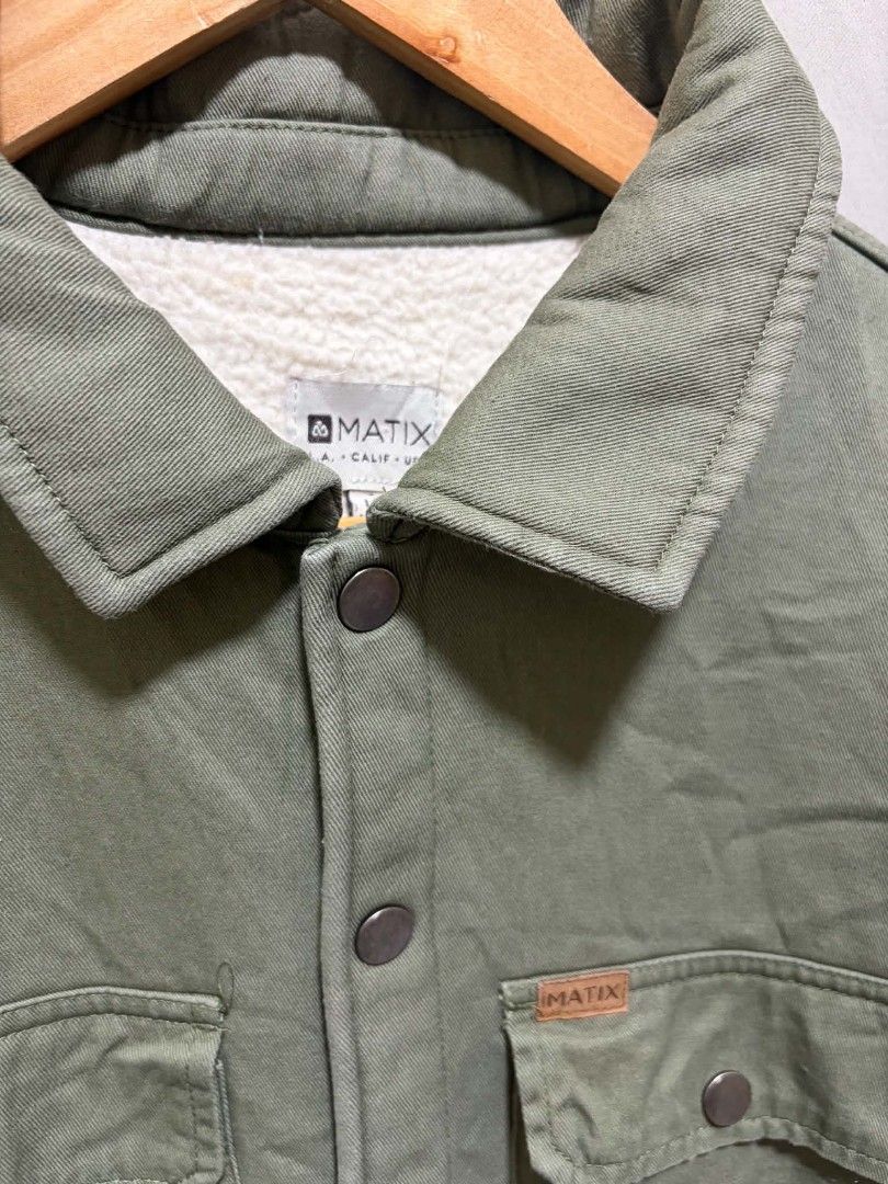 Matix Olive Green Sherpa Lined Button Up Jacket (Category: Coats, Jackets and Outerwear) located in Quezon City. Submitted by kimzxc_536 (Listing ID 1469544864, Image 3). Description: BRAND: MATIX SHERPA YUNG LOOB Size: XLARGE Dimes :23.5 x 29 Condition: EXCELLENT Colorate: 9.5/10 Issue: ❌ Price: 550.