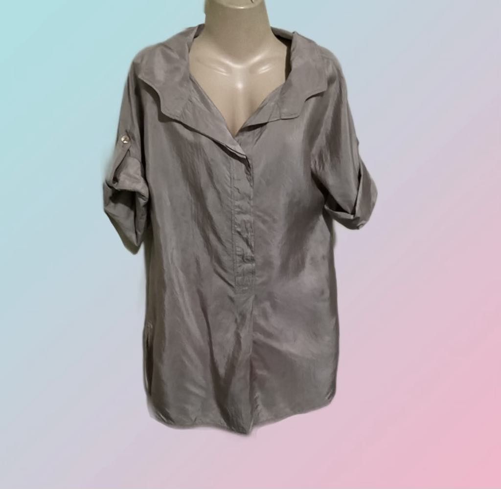 Max Mara Weekend Gray Tunic Shirt Large (Category: Longsleeves) located in Paranaque City. Submitted by calm_youngstore7 (Listing ID 1469402038, Image 2). Description: LAST PIECE SALE! - Brand: Max Mara Weekend - Size: Large - Color: BRONZE - Material: Premium fabric with a subtle sheen - Design: Classic collar, half button placket, roll-up short sleeves, curved hem with side splits, and pleated back yoke - Measurements: ~19" across chest, ~29" t