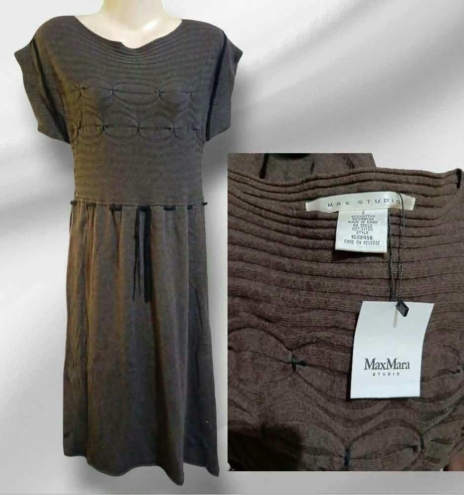 Max Studio Grey Knit Dress Size S (Category: Dresses) located in Paranaque City. Submitted by calm_youngstore7 (Listing ID 1469444519, Image 3). Description: - Brand: Max Studio - Condition: Brand new with tags attached - Color: Grey - Length: Midi - Details: Short sleeves, scoop neckline, textured upper bodice pattern, and adjustable drawstring waist - Perfect for casual outings or smart-casual wear.