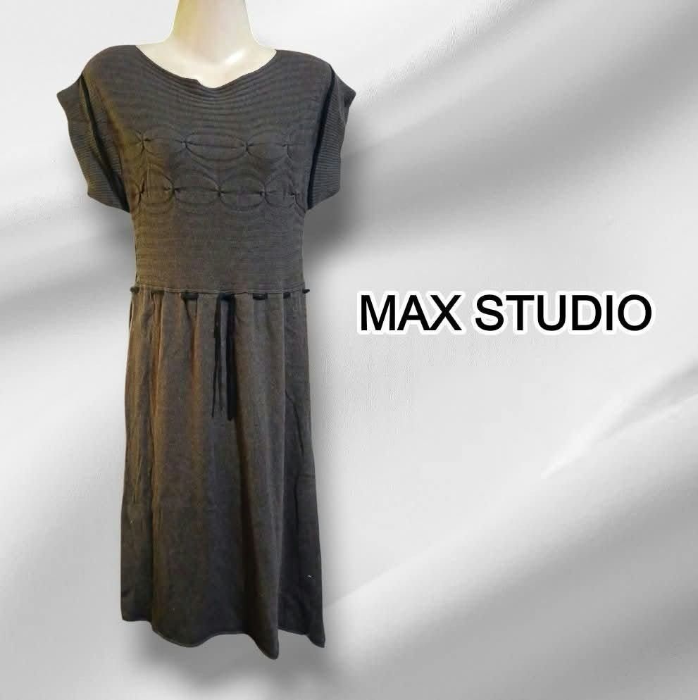 Max Studio Grey Knit Dress Size S (Category: Dresses) located in Paranaque City. Submitted by calm_youngstore7 (Listing ID 1469444519, Image 1). Description: - Brand: Max Studio - Condition: Brand new with tags attached - Color: Grey - Length: Midi - Details: Short sleeves, scoop neckline, textured upper bodice pattern, and adjustable drawstring waist - Perfect for casual outings or smart-casual wear.