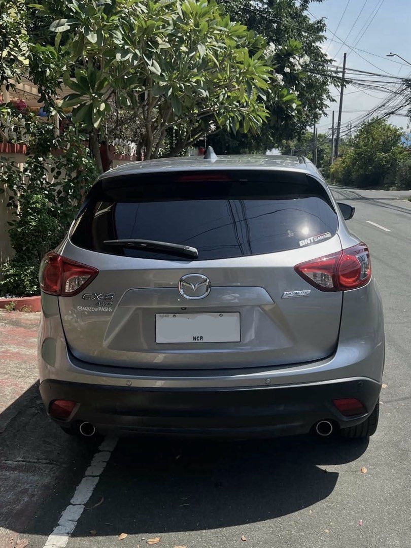 Mazda CX-5 2.5 2WD Luxury (A) (Category: Used Cars) located in Paranaque City. Submitted by _heysoftie (Listing ID 1469536082, Image 3). Description: 2014 MAZDA CX-5 AWD SPORT 2.5L — top of the line CAR DETAILS Make & Model: Mazda CX-5 AWD Sport Year Model: 2014 Engine: 2.5L Gasoline Transmission: Automatic Mileage: 69,600km Color: Aluminum Metallic Body Type: SUV Seating Capacity: 5 Plate Number: Thursday Coding OR/CR: Available Registration Sta