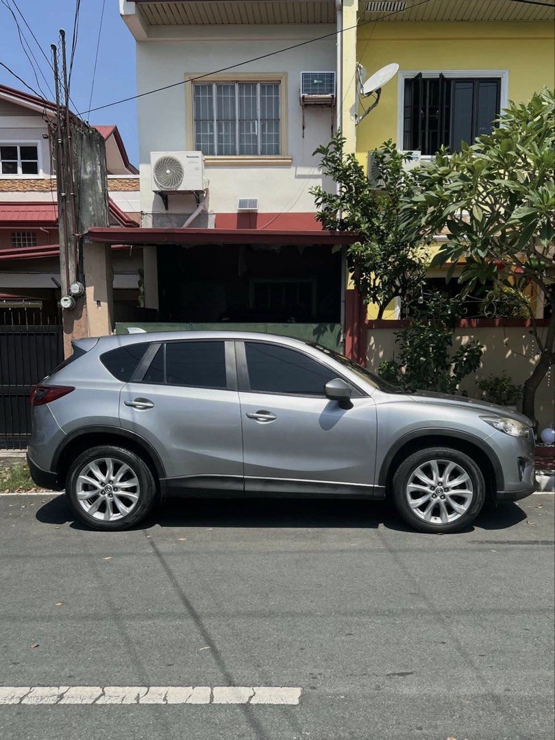 Mazda CX-5 2.5 2WD Luxury (A) (Category: Used Cars) located in Paranaque City. Submitted by _heysoftie (Listing ID 1469536082, Image 1). Description: 2014 MAZDA CX-5 AWD SPORT 2.5L — top of the line CAR DETAILS Make & Model: Mazda CX-5 AWD Sport Year Model: 2014 Engine: 2.5L Gasoline Transmission: Automatic Mileage: 69,600km Color: Aluminum Metallic Body Type: SUV Seating Capacity: 5 Plate Number: Thursday Coding OR/CR: Available Registration Sta