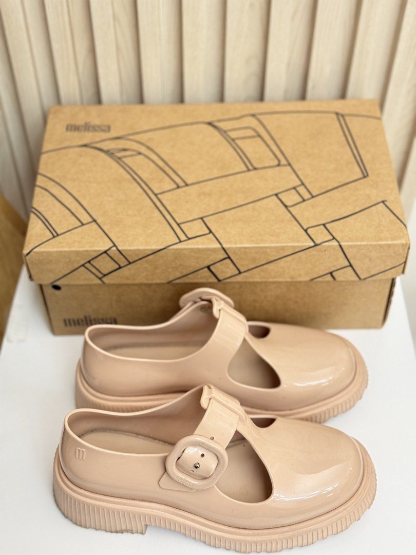 Melissa Jackie AD Beige Mary Jane Platform Shoes (Category: Flats & Sandals) located in Pasig City. Submitted by eiramcat01 (Listing ID 1469534731, Image 3). Description: - Brand: Melissa Jackie AD - Color: Beige - Size: US 5 - Style: Chunky platform sole with T-strap design and buckle closure - Material: Water-resistant jelly, easy to clean - Still smell like candy - Origin: Made in Brazil - Inclusion: Original box included Rarely used Orig Pric