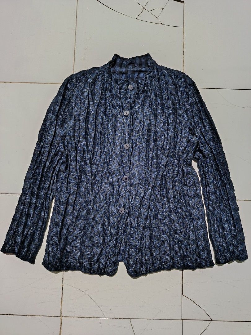 Men Issey Miyake Reversible Pleated Blue Check Button Jacket (Category: Coats, Jackets and Outerwear) located in Barotac Nuevo. Submitted by gray101 (Listing ID 1469510306, Image 1). Description: - Brand: Issey Miyake - Color: Deep blue - Style: Reversible Button-up jacket with mandarin collar - Design: Distinct all-over pleated look with textured crinkle pattern and subtle weave - Features: Branded front buttons, lightweight fabric - Condition: 