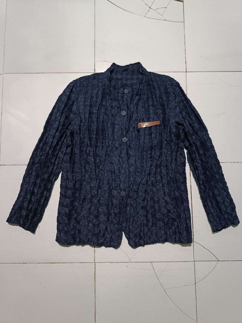 Men Issey Miyake Reversible Pleated Blue Check Button Jacket (Category: Coats, Jackets and Outerwear) located in Barotac Nuevo. Submitted by gray101 (Listing ID 1469510306, Image 2). Description: - Brand: Issey Miyake - Color: Deep blue - Style: Reversible Button-up jacket with mandarin collar - Design: Distinct all-over pleated look with textured crinkle pattern and subtle weave - Features: Branded front buttons, lightweight fabric - Condition: 