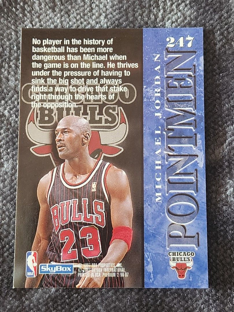 Michael Jordan 247 (Category: Raw Singles) located in Manila. Submitted by kg613 (Listing ID 1469418768, Image 2). Description: - Player: Michael Jordan (Chicago Bulls) - Set: 1996-97 SkyBox Premium - Pointmen - Card Number: 247 - Front Design: Jordan driving to the basket in his red Bulls uniform - Back Design: Player info, Bulls logo background, and Jordan in a pinstripe jersey - Origin: Printed in the USA - Condition: Authentic and well-kept, 