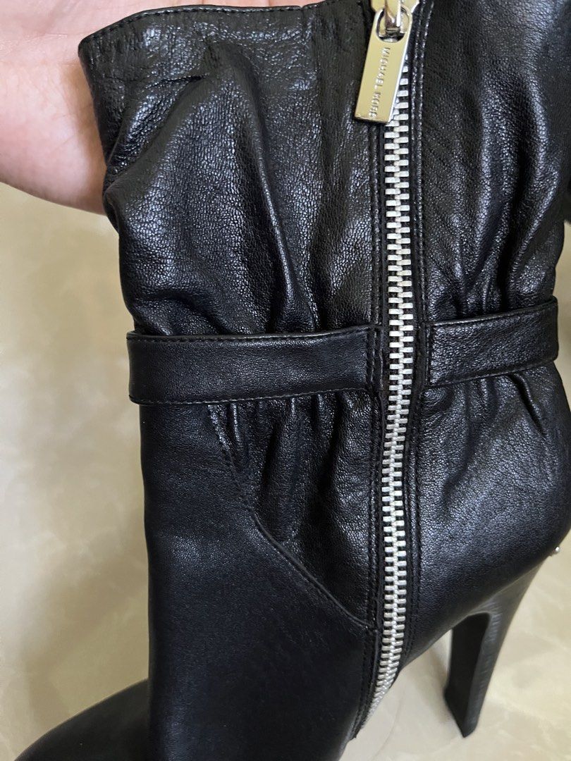 Michael Kors Black Leather Heeled Boots Size 6.5M (Category: Boots) located in Vintar. Submitted by layla.ly (Listing ID 1469447739, Image 3). Description: - Michael Kors - Black leather boots with high stiletto heel and front platform - Size: 6.5 - Design details: Slouchy upper, buckled strap accent, full side zipper with branded pull tab - Materials: Leather upper, rubber sole - inner has a washable stain Price is still negotiable MOP: GCASH/GO