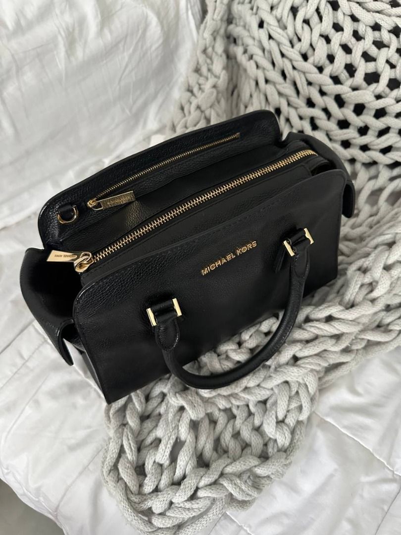 Michael Kors Black Leather Satchel Handbag (Category: Luxury Bags & Wallets) located in Quezon City. Submitted by flipandfind (Listing ID 1469426818, Image 3). Description: rarely used, sold as is, no other inclusions - Brand: Michael Kors - Material: Premium black pebble leather - Hardware: Elegant gold-tone hardware - Closure: Secure zip-top main compartment - Handles: Double top handles with metal details - Interior: Includes smaller pockets a