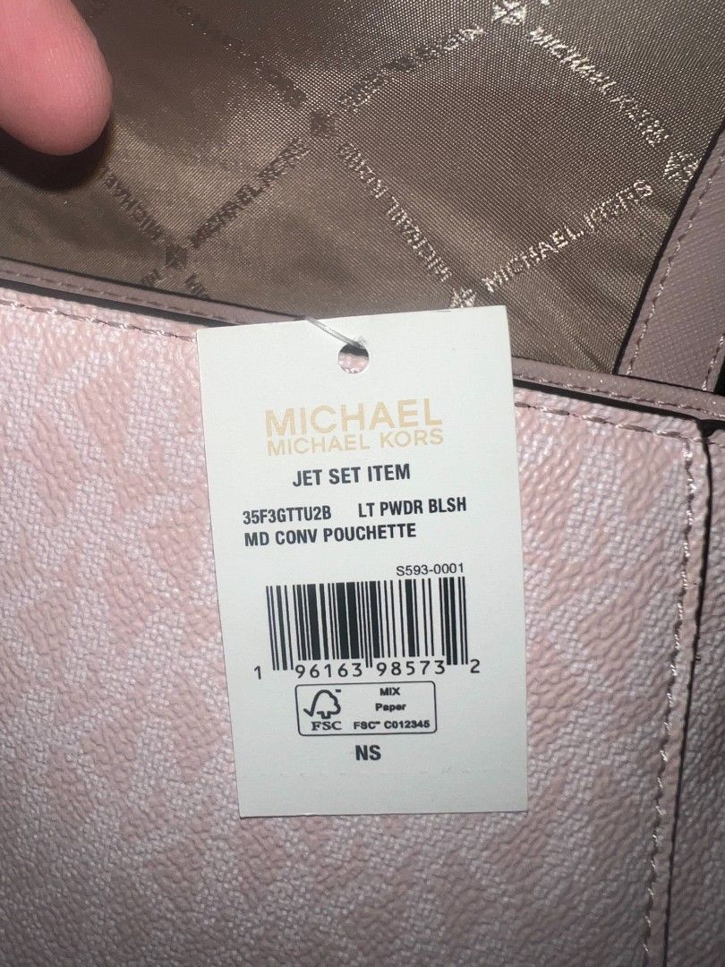 Michael Kors Jet Set Light Ceossbody Bag (Category: Luxury Bags & Wallets) located in Cebu City. Submitted by jomjomhernando31-16115 (Listing ID 1469550331, Image 3). Description: - Brand: Michael Kors - Style: Jet Set Item Medium Convertible Pouchette (Style No: 35F3GTTU2B) - Colorway: Light Powder Blush pink with signature MK monogram print - Hardware: Gold-tone - Condition: Brand new with original store tag attached - Strap: Removable and adju