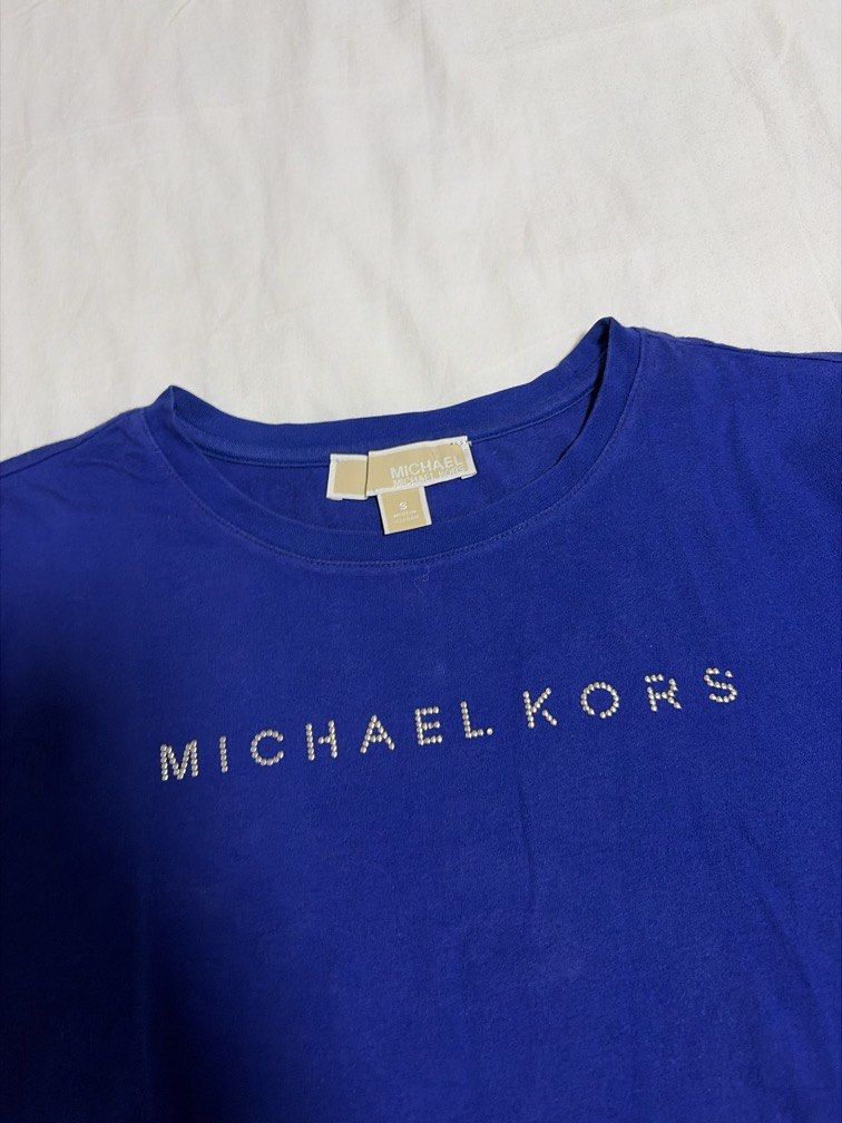 Michael Kors Logo Shirt (Category: Shirts) located in Pasig City. Submitted by chamoisee (Listing ID 1469519906, Image 2). Description: Michael Kors Logo Shirt 16.5”x24” small on tag.