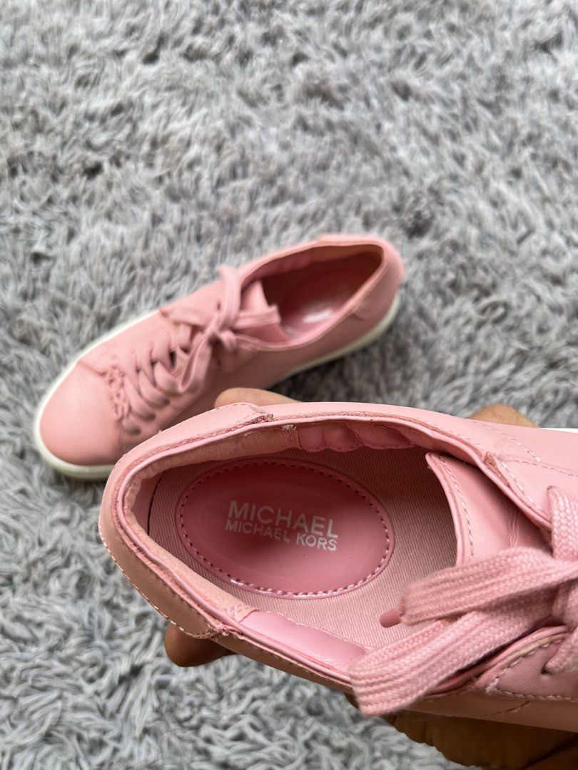 Michael Kors Pink Leather Sneakers (Category: Sneakers) located in Dipolog. Submitted by janja2002 (Listing ID 1469492666, Image 3). Description: - Brand: Michael Kors - Color: Pink with white rubber soles - Material: Premium leather upper, durable rubber tread - Features: Signature 'KORS' letter charms on laces, cushioned branded insoles - Condition: Excellent, clean uppers with minimal toe creases and very little wear on soles - Ideal for: Casu