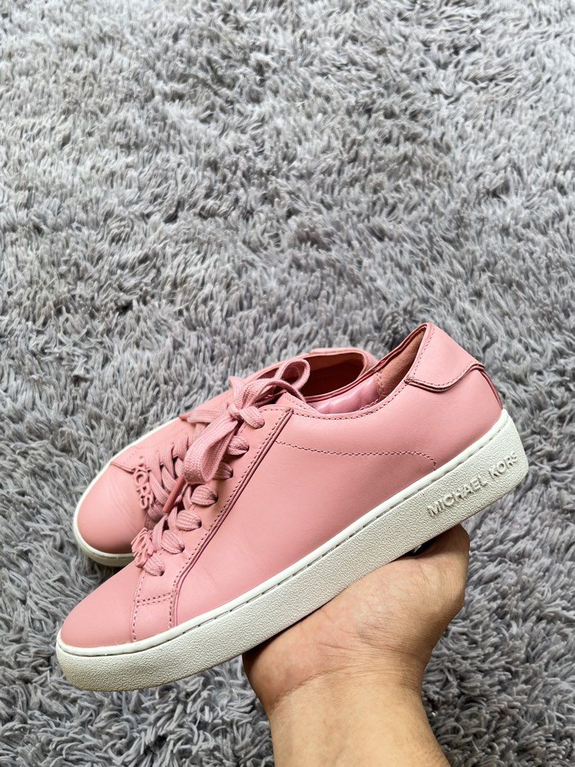 Michael Kors Pink Leather Sneakers (Category: Sneakers) located in Dipolog. Submitted by janja2002 (Listing ID 1469492666, Image 1). Description: - Brand: Michael Kors - Color: Pink with white rubber soles - Material: Premium leather upper, durable rubber tread - Features: Signature 'KORS' letter charms on laces, cushioned branded insoles - Condition: Excellent, clean uppers with minimal toe creases and very little wear on soles - Ideal for: Casu