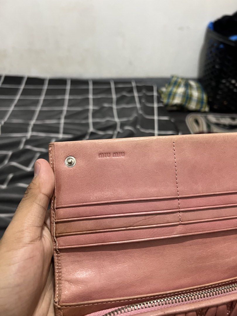 Miu Miu - Wallet - Leather (Category: Wallets & Card holders) located in Cavite. Submitted by asianluxe (Listing ID 1469526593, Image 3). Description: Good condition Very presentable Minimal flaw sa back .