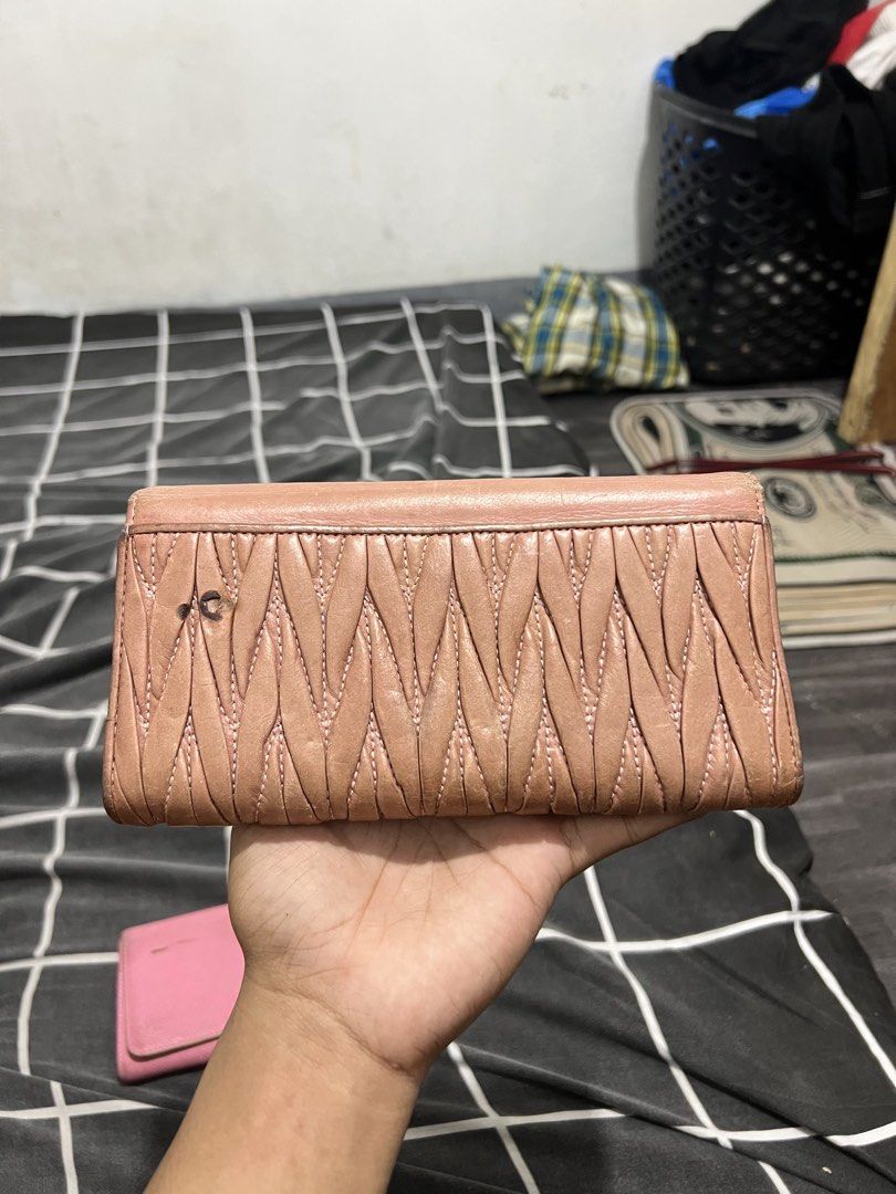 Miu Miu - Wallet - Leather (Category: Wallets & Card holders) located in Cavite. Submitted by asianluxe (Listing ID 1469526593, Image 2). Description: Good condition Very presentable Minimal flaw sa back .