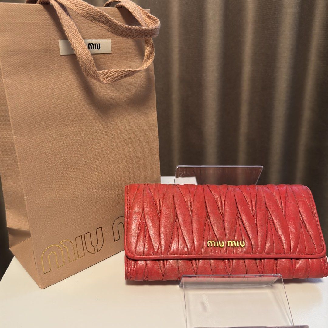 Miu Miu long wallet (Category: Wallets & Card holders) located in Quezon City. Submitted by hintstreet (Listing ID 1469323477, Image 1). Description: With dustbag and paper bag .