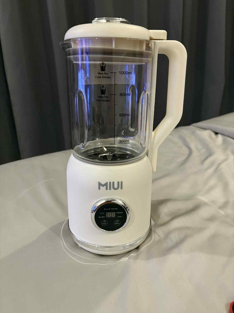 MIUI Multifunctional Food Blender (Category: Juicers, Blenders & Grinders) located in Marikina City. Submitted by wildmoon7459 (Listing ID 1469468837, Image 2). Description: - Product: MIUI Mammoth-S Food Blender - Color: White - Functionality: Handles both hot and cold blending - Control Panel: Digital settings for soymilk, rice paste, juice, boil water, keep warm, and clean - Inclusions: Power cord, measuring spoon, cleaning brush, instruction 