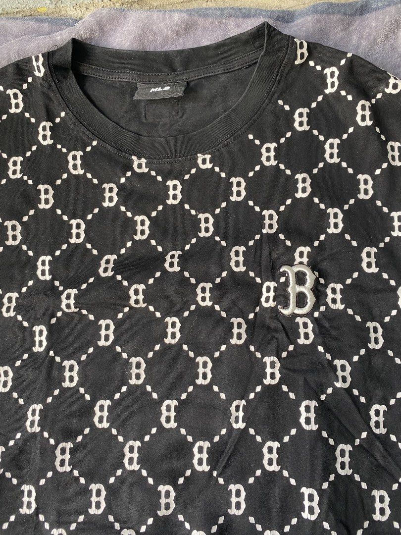 MLB Boston Red Sox Monogram Black T-Shirt (Category: Tshirts & Polo Shirts ) located in Manila. Submitted by kenonskiee (Listing ID 1469551465, Image 3). Description: Black MLB Boston Red Sox monogram all-over print tee. Short sleeves, round neckline. Small embroidered logo patch on the chest. Material tag shows cotton and polyester blend. Style code 31TSP3131..