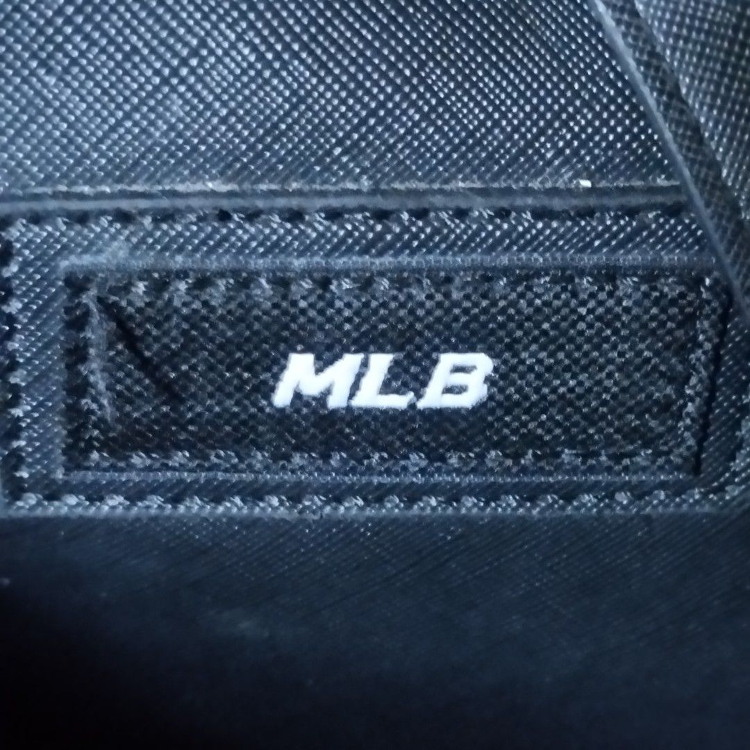 MLB New York Yankees Monogram Tote Bag (Category: Tote Bags) located in Manila. Submitted by lene48 (Listing ID 1469507205, Image 3). Description: - MLB New York Yankees tote bag - Chic monogram print with iconic NY logo on the front - Spacious interior designed for daily use - Comfortable double shoulder straps and durable dark corner patches - Includes black interior tag with MLB branding, manufacturing details, and QR code for authenticity, 15
