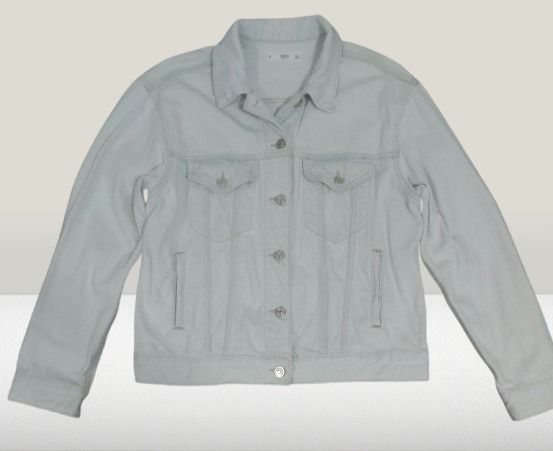 MNG Light Wash Denim Jacket (Category: Coats, Jackets and Outerwear) located in Davao. Submitted by rosewyn (Listing ID 1469468468, Image 1). Description: - Brand: MNG - Color: White (clean light wash) - Closure: Button-up front with metallic hardware - Pockets: 2 chest flap pockets and 2 side welt pockets - Details: Subtle light stitching throughout - Fit: Approximately 18 inches shoulder width - Condition: Excellent, ready to wear over any casu