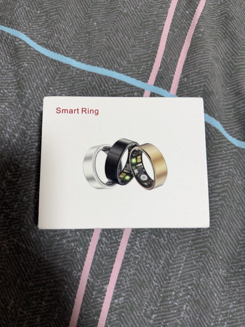 Modofo Smart Ring (Category: Wearables & Smart Watches) located in Binan City. Submitted by alreadyloved.p (Listing ID 1469530328, Image 1). Description: - Brand: Modofo SIZE 8 - Product: Smart Ring - Color: Gold - Condition: Brand new in box - Includes: Smart ring, charging cable, and user manual - Features: Sleek design, fitness and health tracking capabilities.