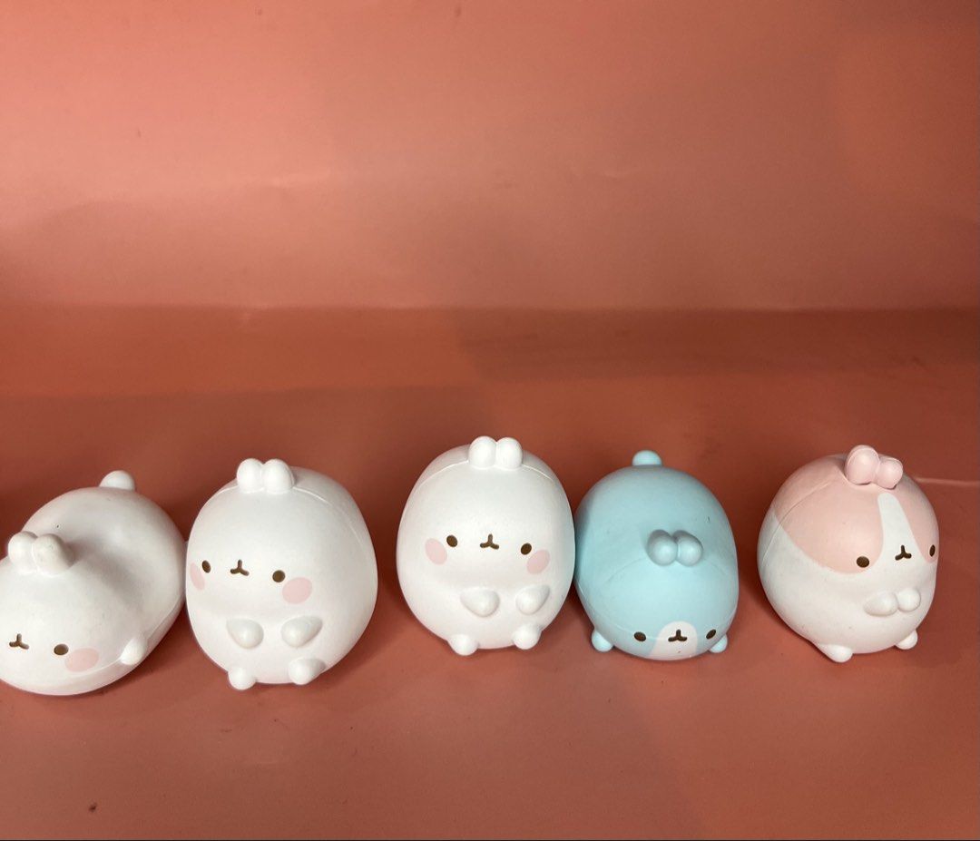 Molang Bunny Figures Collection Set (Category: Designer & Blind Box Toys) located in Caloocan City. Submitted by snapshop_ph (Listing ID 1469438805, Image 3). Description: - Set of cute Molang rabbit figures in various poses and colors - Includes special pieces like a white rabbit with a yellow chick, solid white ones, a blue one, and a pink-and-white patterned one - Features a smooth matte finish - Perfect for desk decor or collection - Selling 