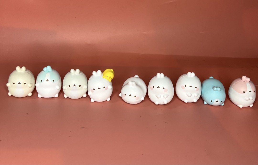 Molang Bunny Figures Collection Set (Category: Designer & Blind Box Toys) located in Caloocan City. Submitted by snapshop_ph (Listing ID 1469438805, Image 1). Description: - Set of cute Molang rabbit figures in various poses and colors - Includes special pieces like a white rabbit with a yellow chick, solid white ones, a blue one, and a pink-and-white patterned one - Features a smooth matte finish - Perfect for desk decor or collection - Selling 