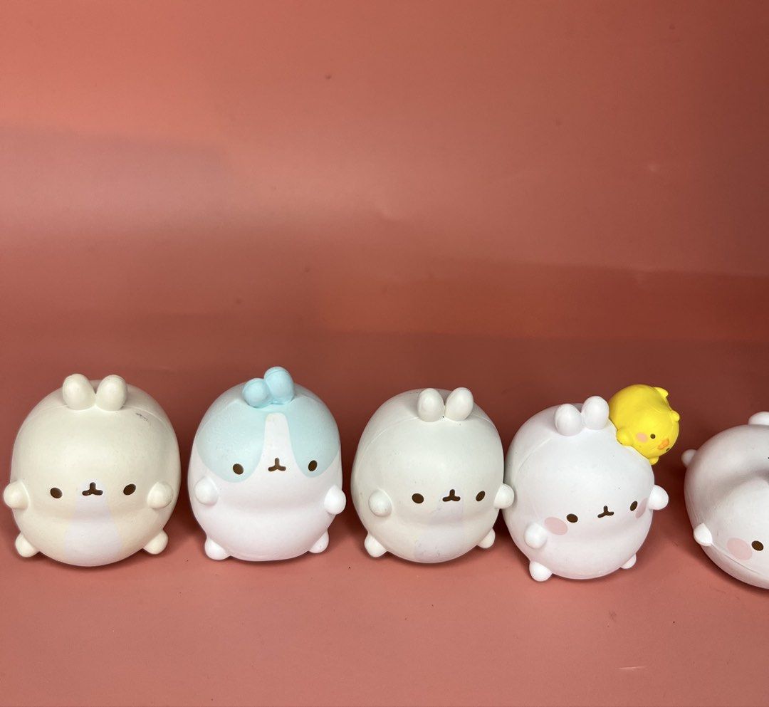 Molang Bunny Figures Collection Set (Category: Designer & Blind Box Toys) located in Caloocan City. Submitted by snapshop_ph (Listing ID 1469438805, Image 2). Description: - Set of cute Molang rabbit figures in various poses and colors - Includes special pieces like a white rabbit with a yellow chick, solid white ones, a blue one, and a pink-and-white patterned one - Features a smooth matte finish - Perfect for desk decor or collection - Selling 