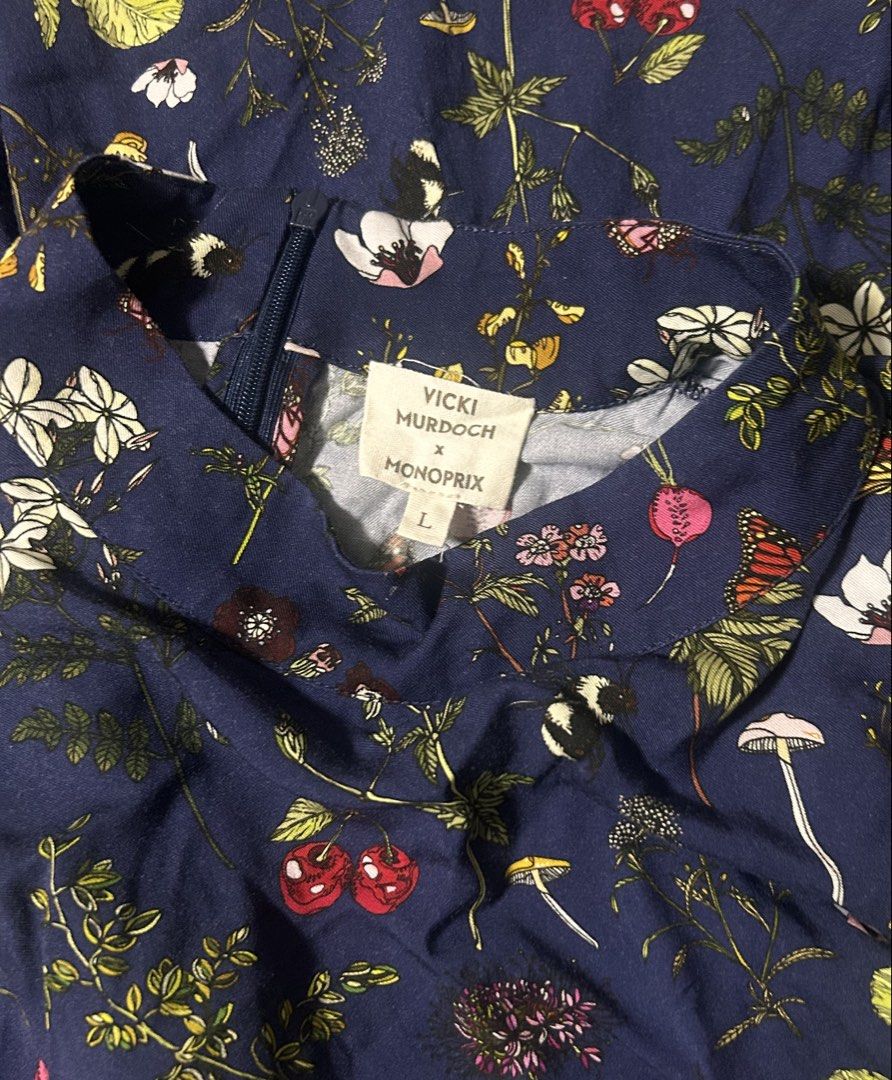 MONOPRIX by VICKI MURDOCH (Category: Dresses) located in Davao. Submitted by sart0ria85 (Listing ID 1469535631, Image 3). Description: This French brand collaborated with Vicki Murdoch to create a Navy blue dress with multicolor floral and botanical print (flowers, cherries, mushrooms, butterflies). 100%VISCOSE MADE IN CHINA 🇨🇳 LARGE. Size 8 EXCELLENT CONDITION (96/100).
