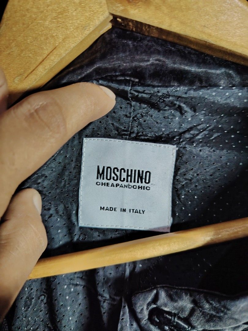 Moschino Cheap and Chic Embellished Wool Jacket (Category: Coats, Jackets and Outerwear) located in Baguio. Submitted by angeloshoppebaguio2600 (Listing ID 1469480885, Image 3). Description: - Brand: Moschino Cheap and Chic - Material: Premium black wool, made in Italy - Design: Front and shoulder decorative bead and button embellishments - Features: Button closure, 3/4 sleeves, and polka dot C patterned lining - Authenticity: Aeffe tag attached 
