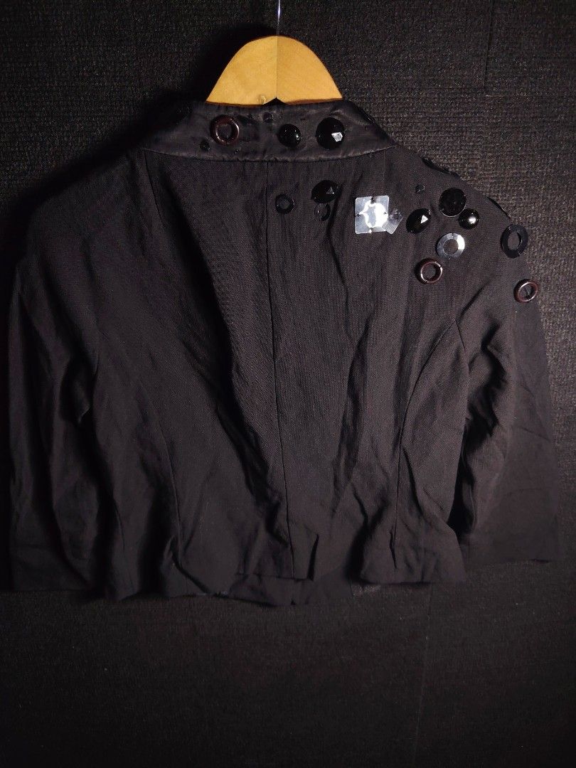 Moschino Cheap and Chic Embellished Wool Jacket (Category: Coats, Jackets and Outerwear) located in Baguio. Submitted by angeloshoppebaguio2600 (Listing ID 1469480885, Image 2). Description: - Brand: Moschino Cheap and Chic - Material: Premium black wool, made in Italy - Design: Front and shoulder decorative bead and button embellishments - Features: Button closure, 3/4 sleeves, and polka dot C patterned lining - Authenticity: Aeffe tag attached 